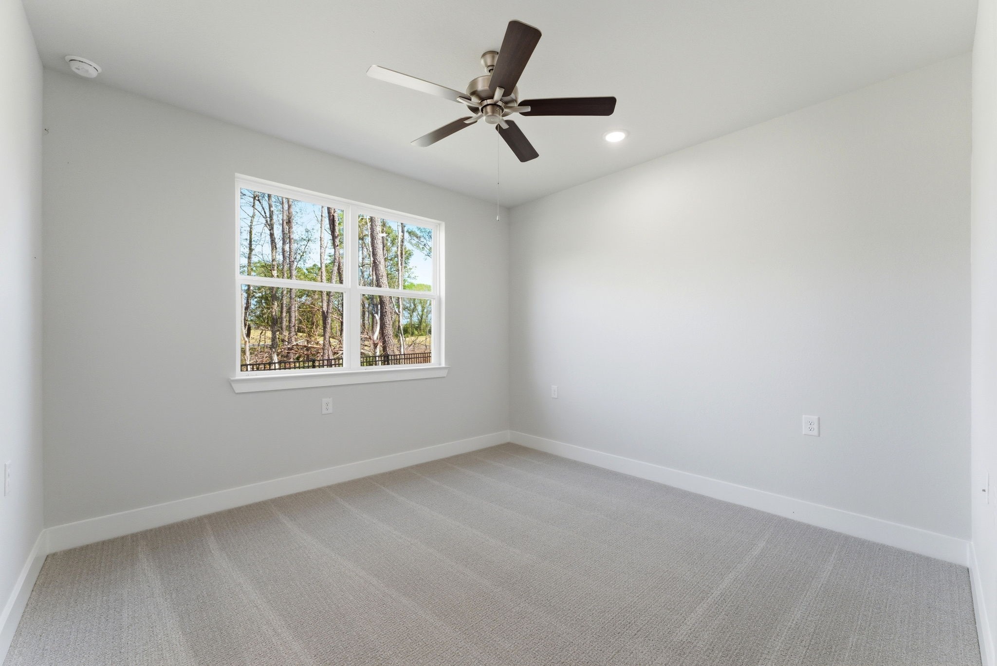 21807 Victory Green Way Porter, TX 77365 - Photo 23 of 50 an empty room with a window