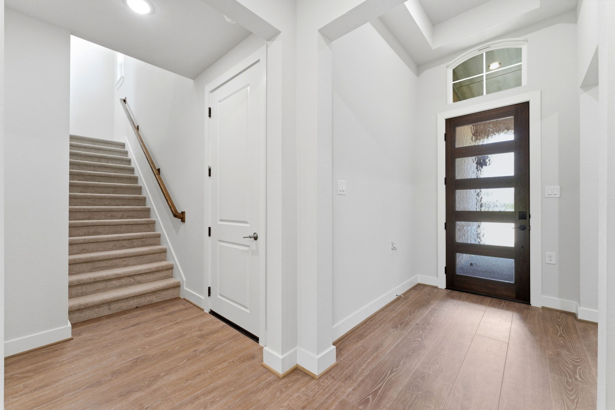 21807 Victory Green Way Porter, TX 77365 - Photo 24 of 50 a view of a hallway with wooden floor and entryway