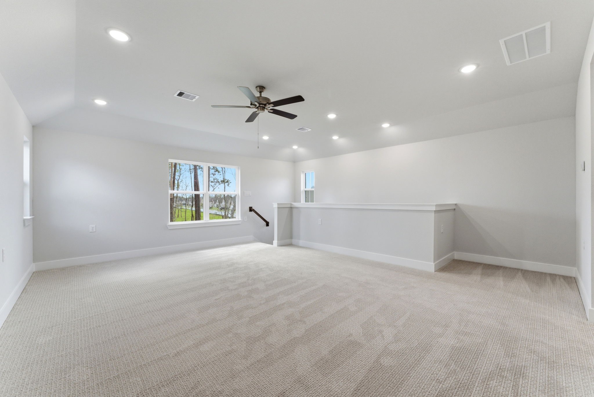 21807 Victory Green Way Porter, TX 77365 - Photo 26 of 50 a view of an empty room with a window