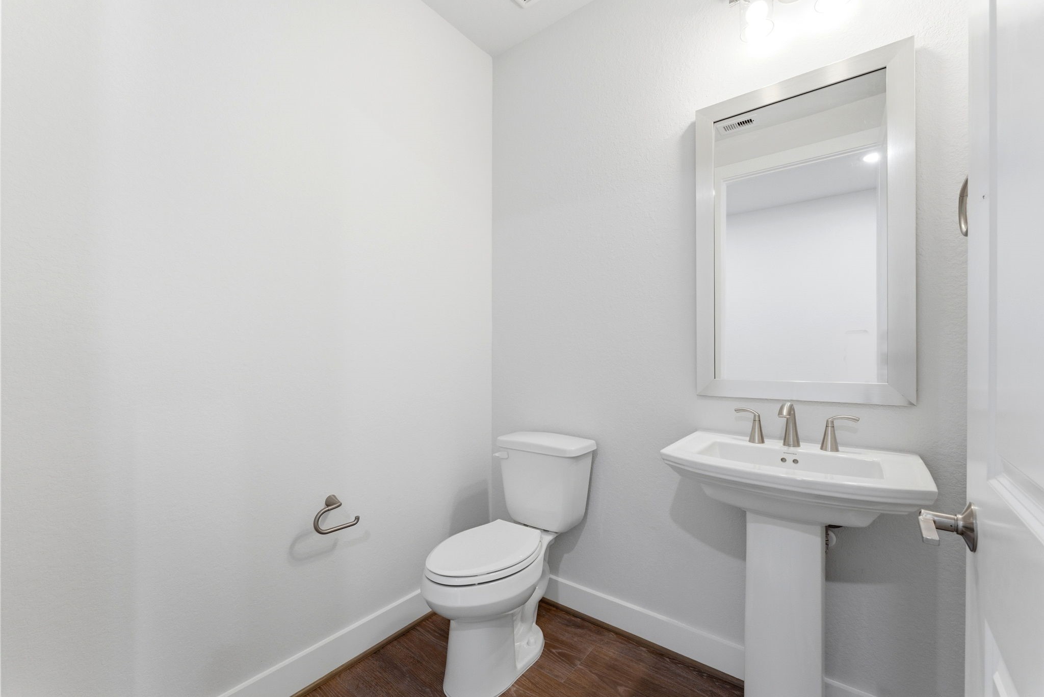 21807 Victory Green Way Porter, TX 77365 - Photo 30 of 50 a bathroom with a toilet sink and mirror