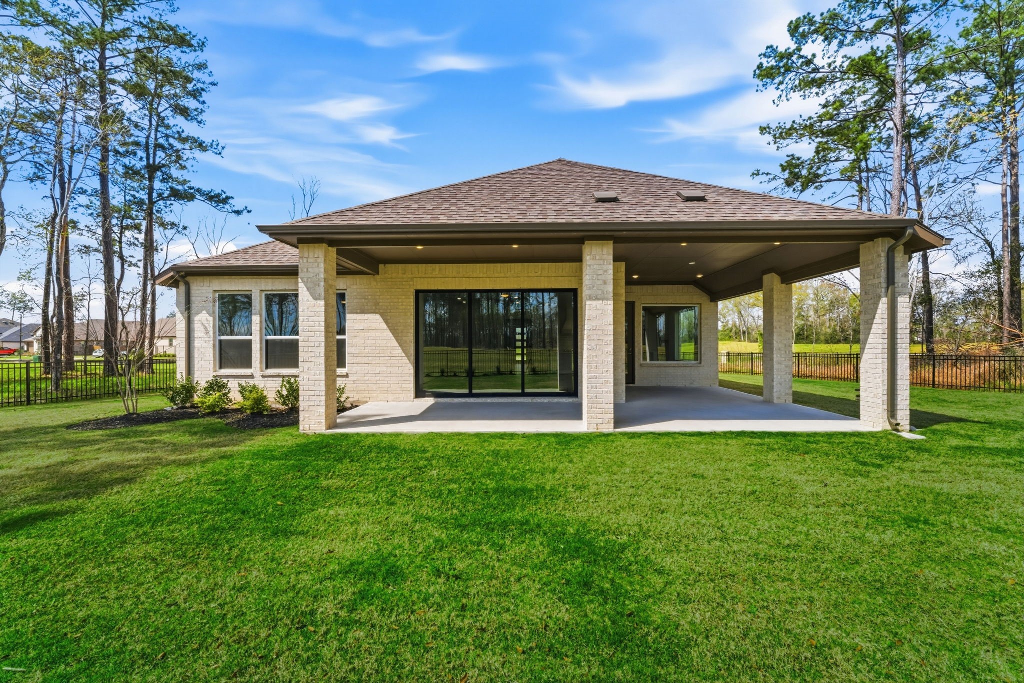 21807 Victory Green Way Porter, TX 77365 - Photo 33 of 50 a front view of a house with a garden