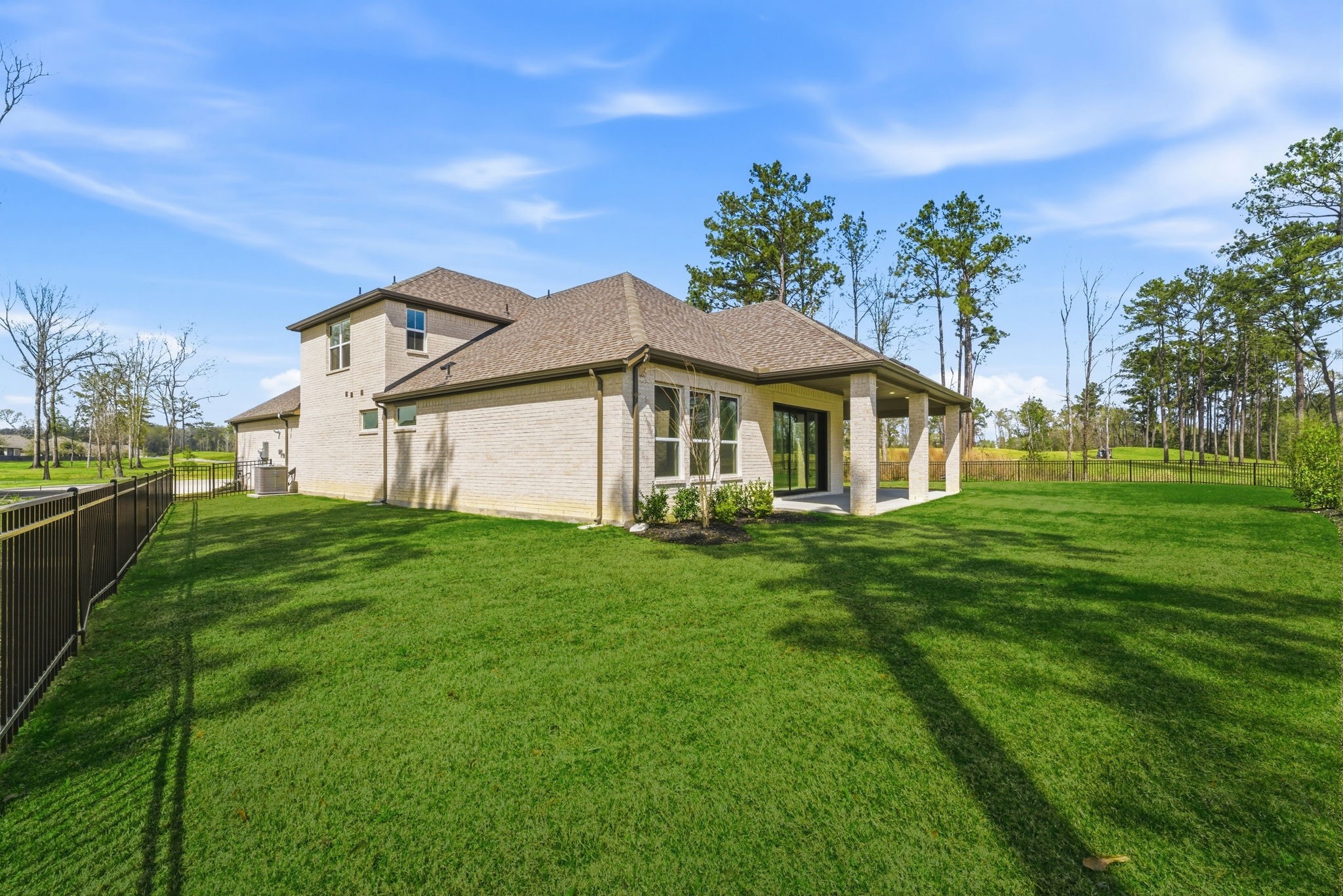 21807 Victory Green Way Porter, TX 77365 - Photo 34 of 50 a view of a house with a big yard and potted plants
