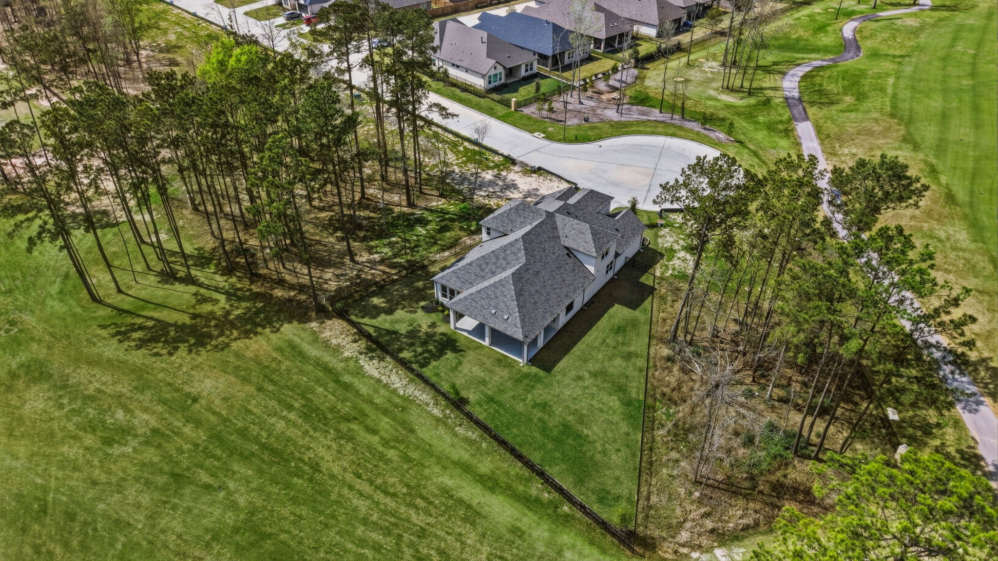 21807 Victory Green Way Porter, TX 77365 - Photo 41 of 50 a view of a house with a backyard