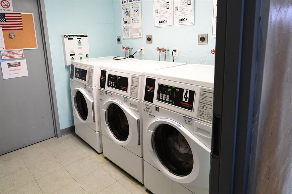 159 Franklin Street, Unit C2 Stoneham, MA 02180 - Photo 5 of 7 a utility room with dryer and washer