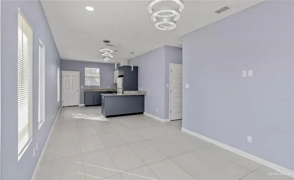 a view of a storage & utility room with a window