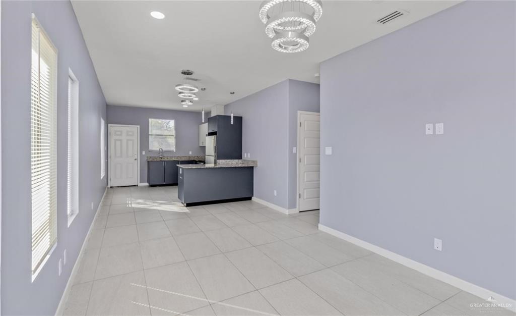 1200 West Harrison Avenue, Unit 2 Alton, TX 78573 - Photo 2 of 11 a view of a storage & utility room with a window