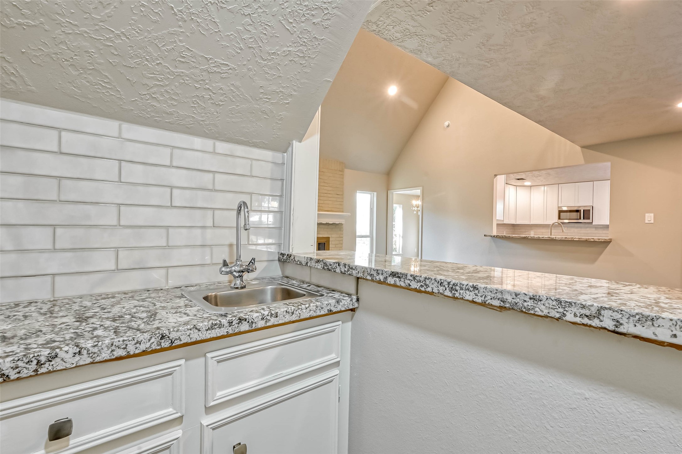 3615 Highfalls Drive Houston, TX 77068 - Photo 17 of 45 a bathroom with a granite countertop sink and a mirror