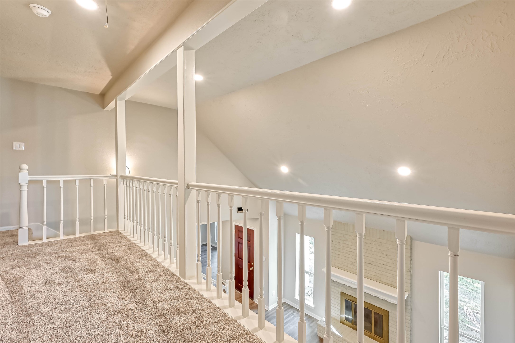 3615 Highfalls Drive Houston, TX 77068 - Photo 41 of 45 a view of staircase with rug floor and windows