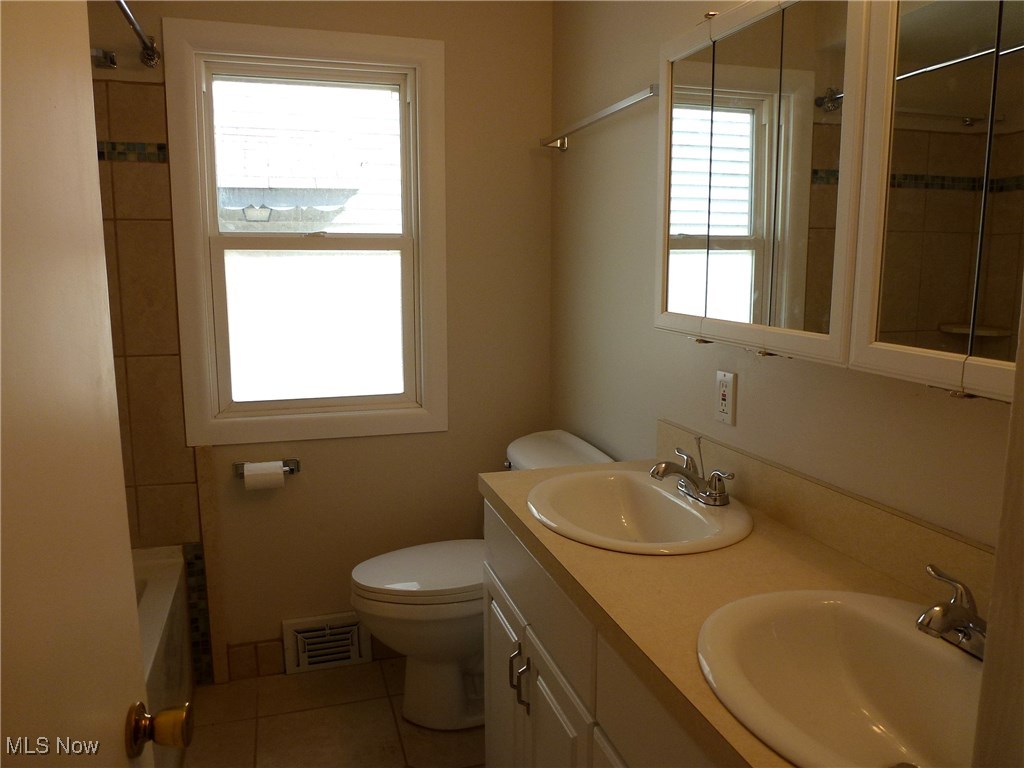 4146 Stonehaven Road Cleveland, OH 44121 - Photo 18 of 25 Totally remodeled 1st floor bath with double sinks.