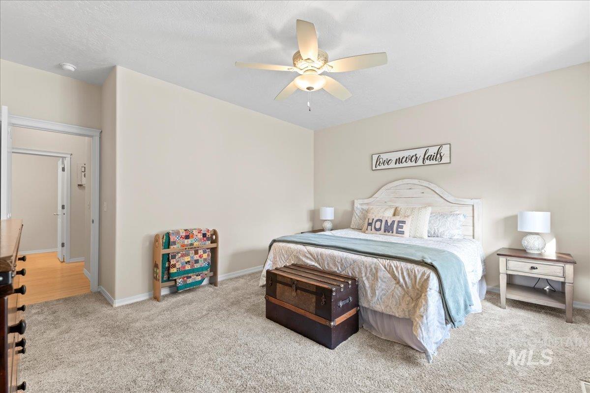 6326 North Talcrest Place Boise, ID 83713 - Photo 20 of 34 Bedroom with a ceiling fan and light carpet