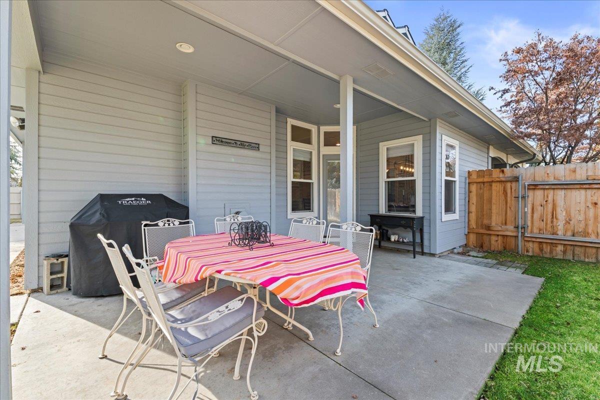 6326 North Talcrest Place Boise, ID 83713 - Photo 29 of 34 View of patio / terrace with area for grilling, outdoor dining area, and a gate