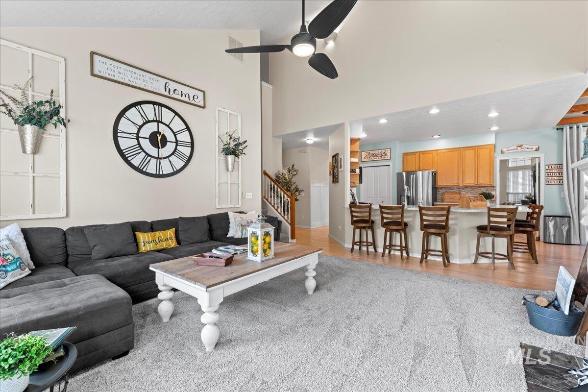 6326 North Talcrest Place Boise, ID 83713 - Photo 8 of 34 Living room featuring a ceiling fan, recessed lighting, and lofted ceiling