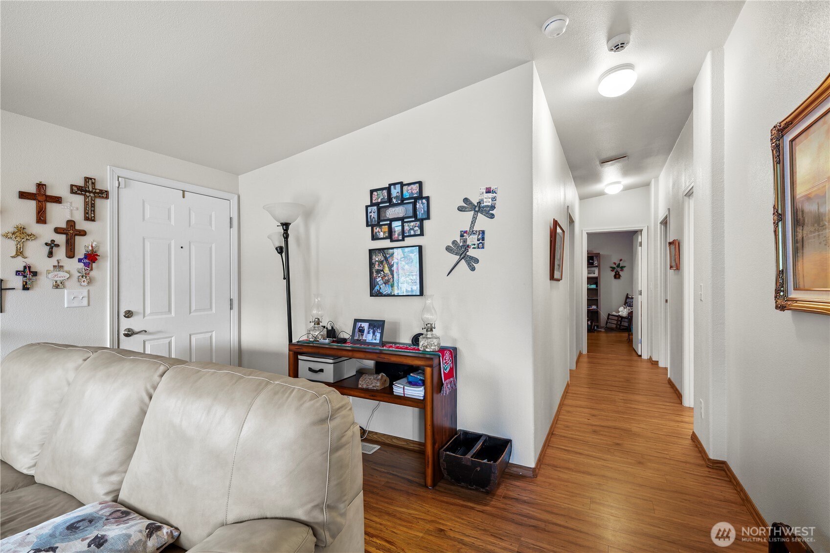 19206 99th Avenue East, Unit 48 Graham, WA 98338 - Photo 12 of 28 a living room with furniture and a wooden floor