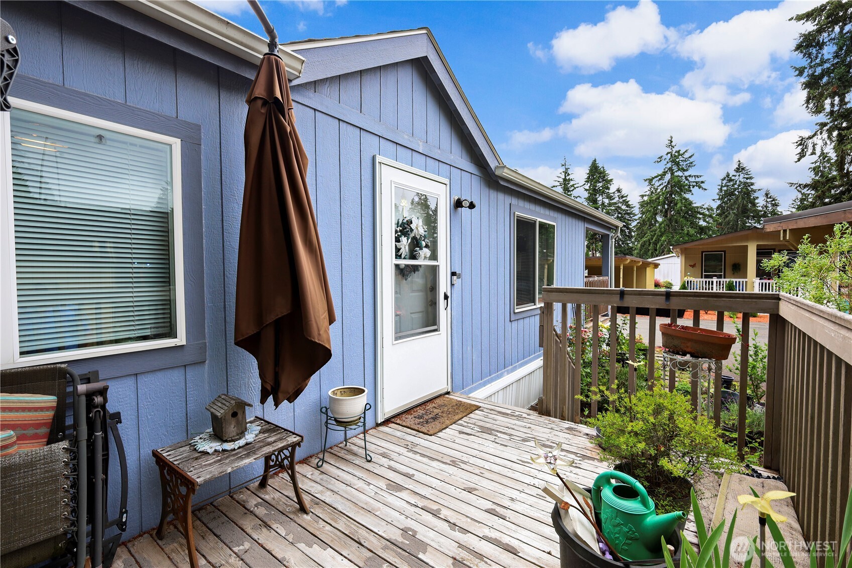 19206 99th Avenue East, Unit 48 Graham, WA 98338 - Photo 20 of 28 a balcony view with a seating space