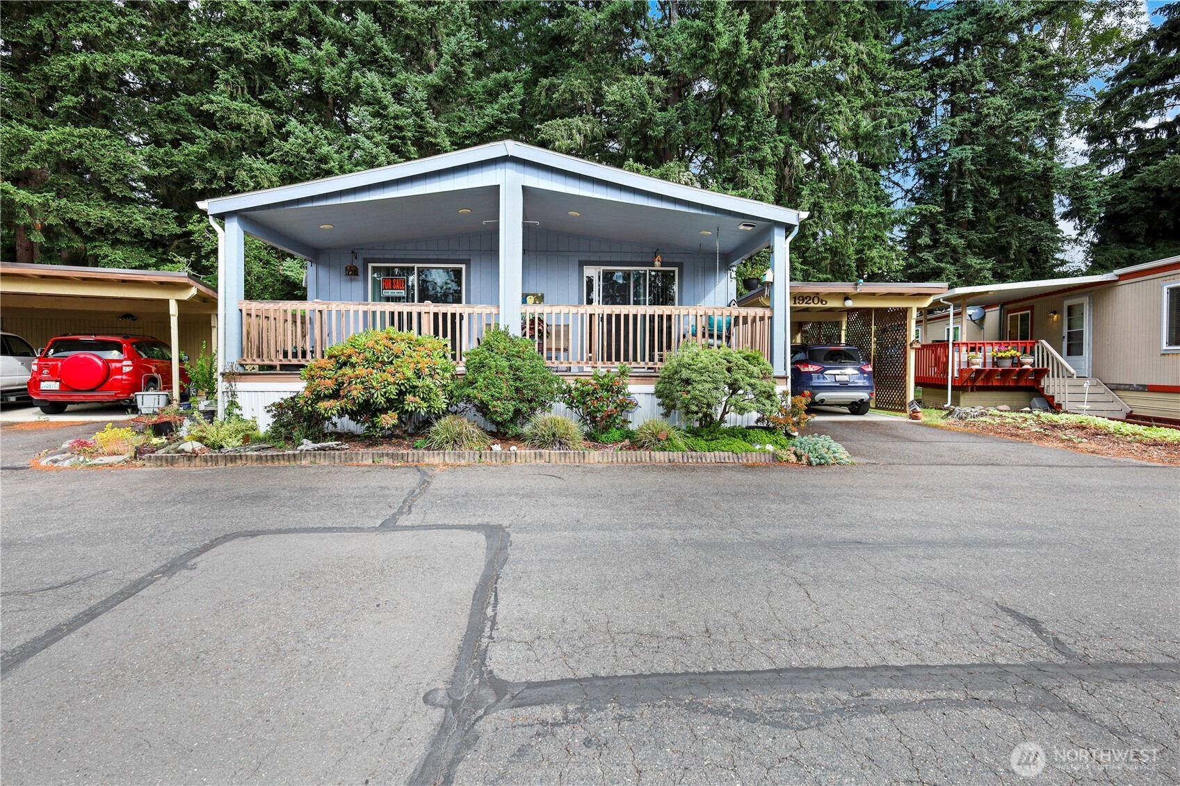19206 99th Avenue East, Unit 48 Graham, WA 98338 - Photo 2 of 28 a front view of house with yard