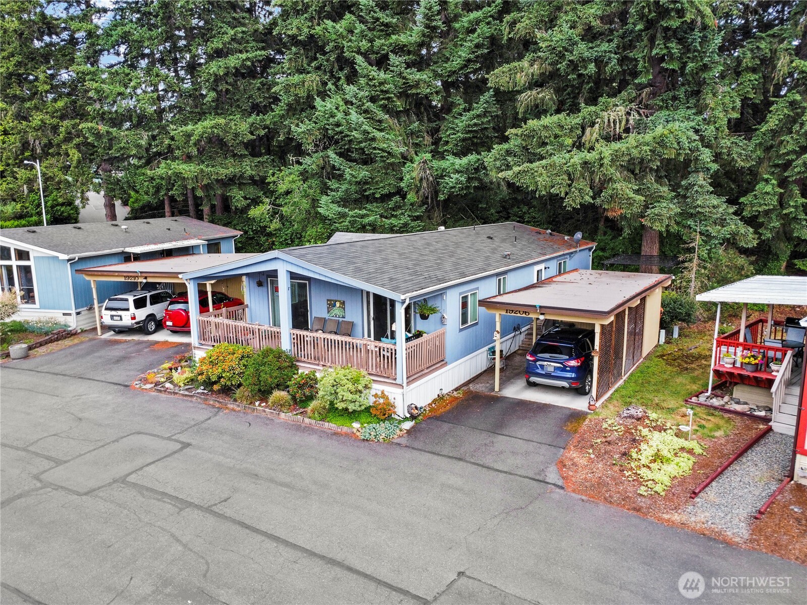 19206 99th Avenue East, Unit 48 Graham, WA 98338 - Photo 22 of 28 an aerial view of a house with garden