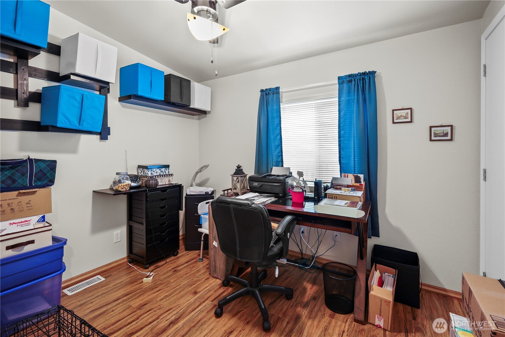 19206 99th Avenue East, Unit 48 Graham, WA 98338 - Photo 8 of 28 a view of a workspace with furniture and a window