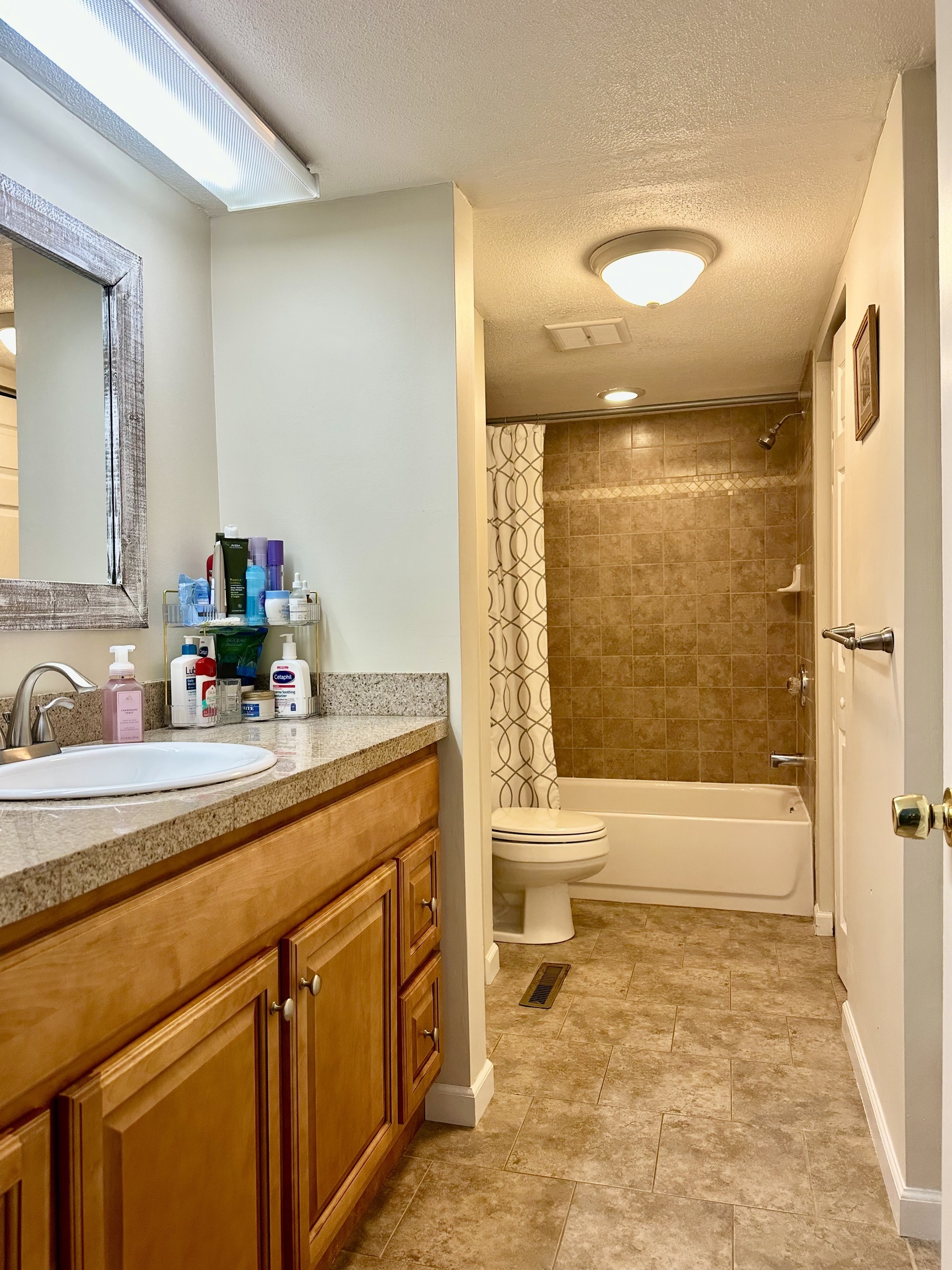 30 Orange Road, Unit 30 Middletown, CT 06457 - Photo 15 of 28 a bathroom with a sink a toilet and shower