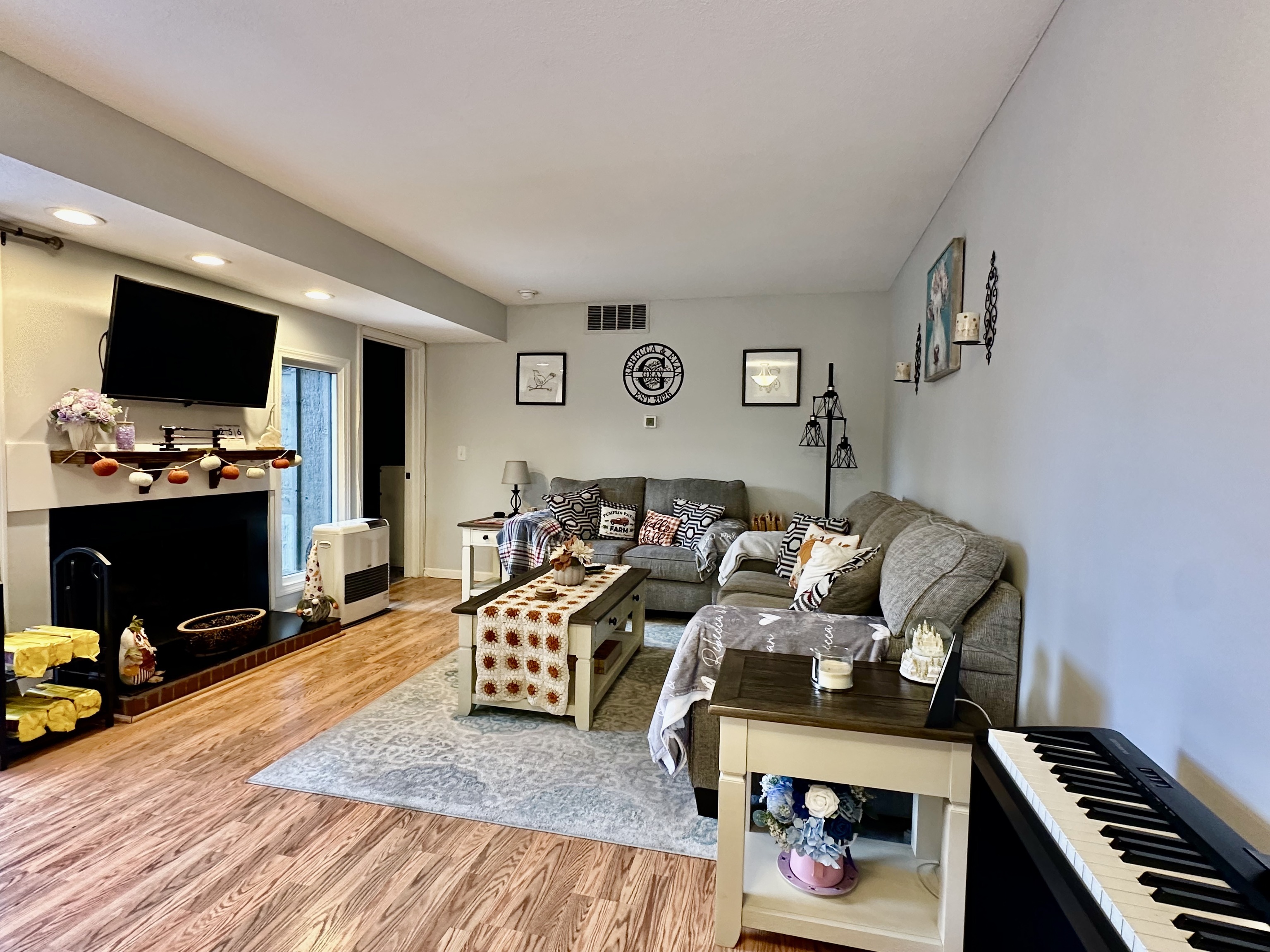 30 Orange Road, Unit 30 Middletown, CT 06457 - Photo 4 of 28 a living room with furniture and a flat screen tv