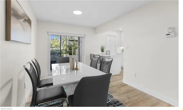 a view of a dining room with furniture