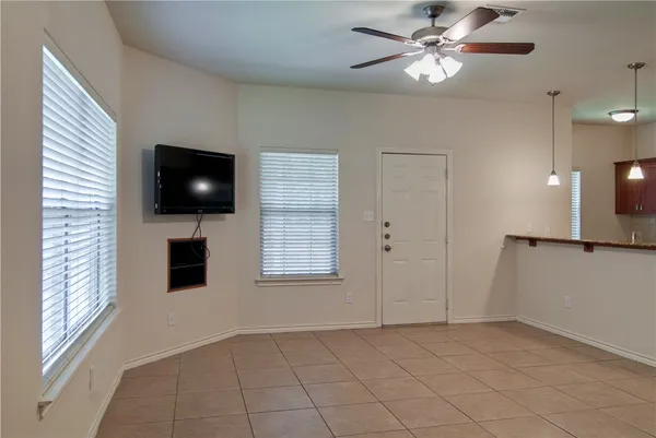 a view of a livingroom with a flat screen tv