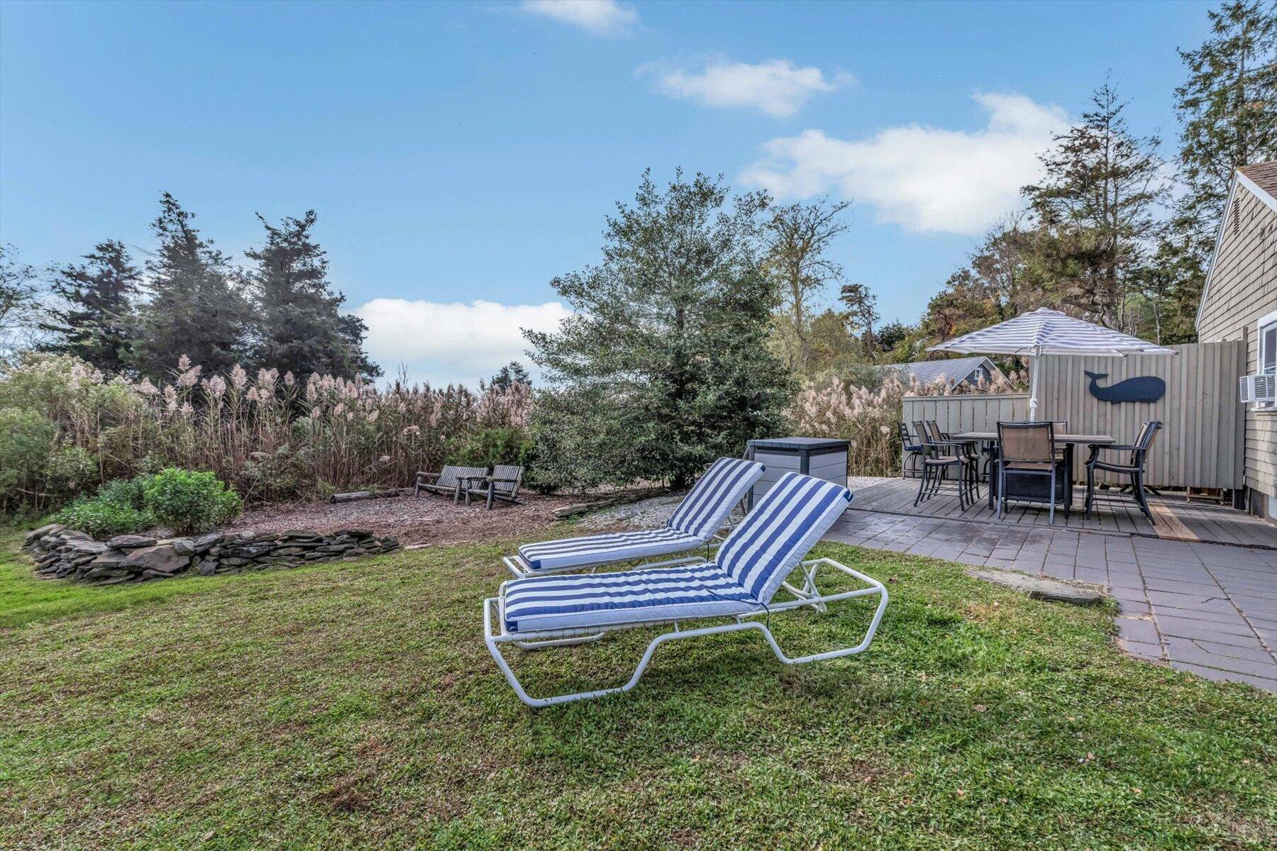722 State Highway Eastham, MA 02642 - Photo 26 of 31 a view of a backyard with sitting area