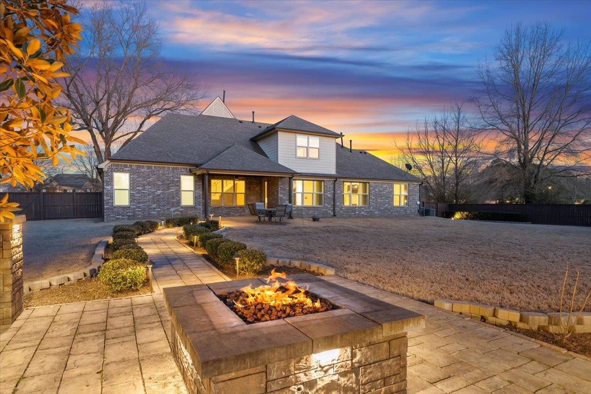 4443 Fleming Road Collierville, TN 38017 - Photo 2 of 40 a front view of a house with garden