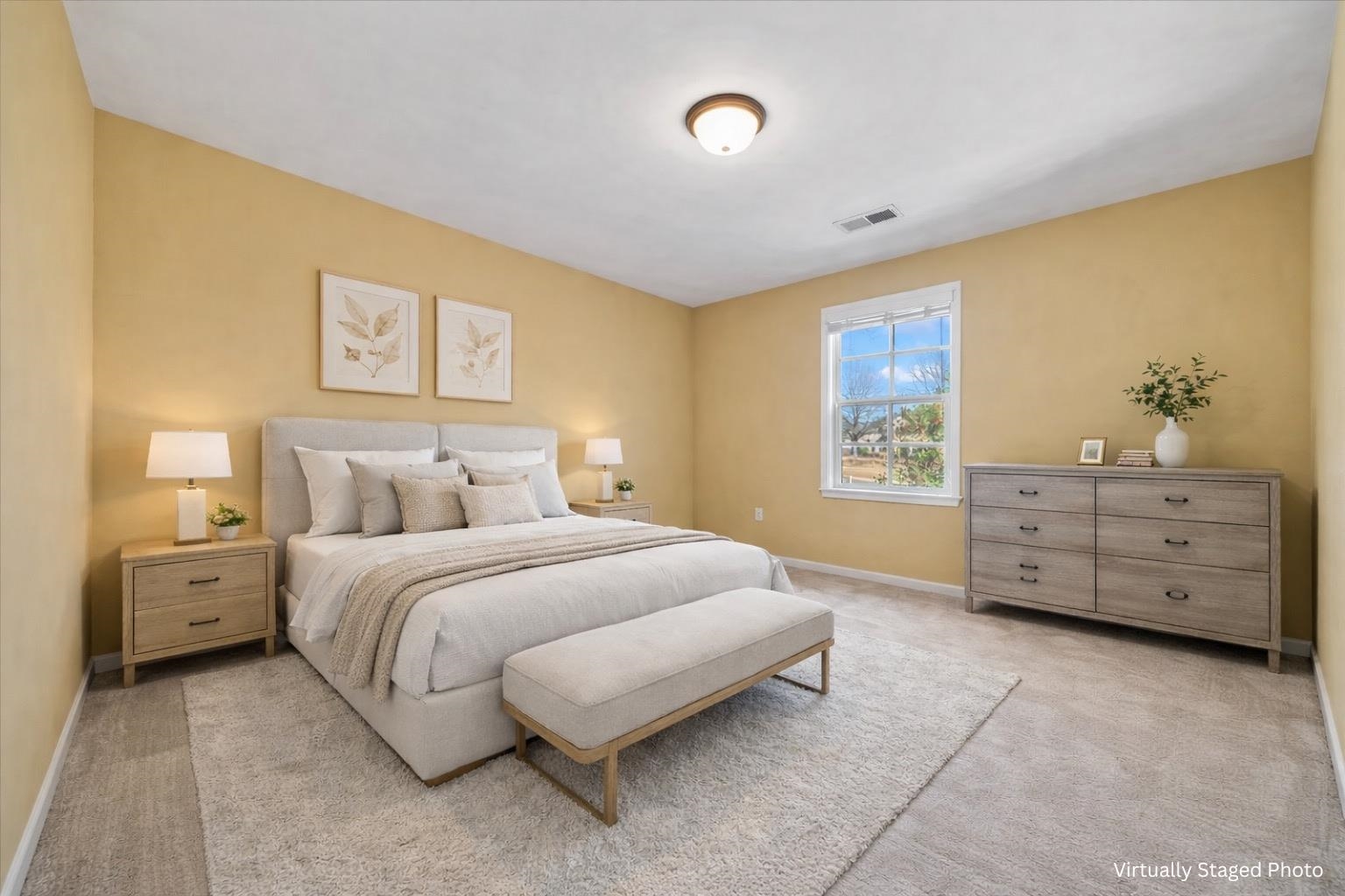 4443 Fleming Road Collierville, TN 38017 - Photo 35 of 40 a spacious bedroom with a bed and a night stand