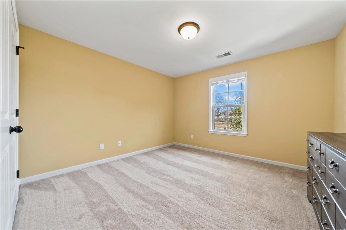 4443 Fleming Road Collierville, TN 38017 - Photo 36 of 40 an empty room with a empty space and a window