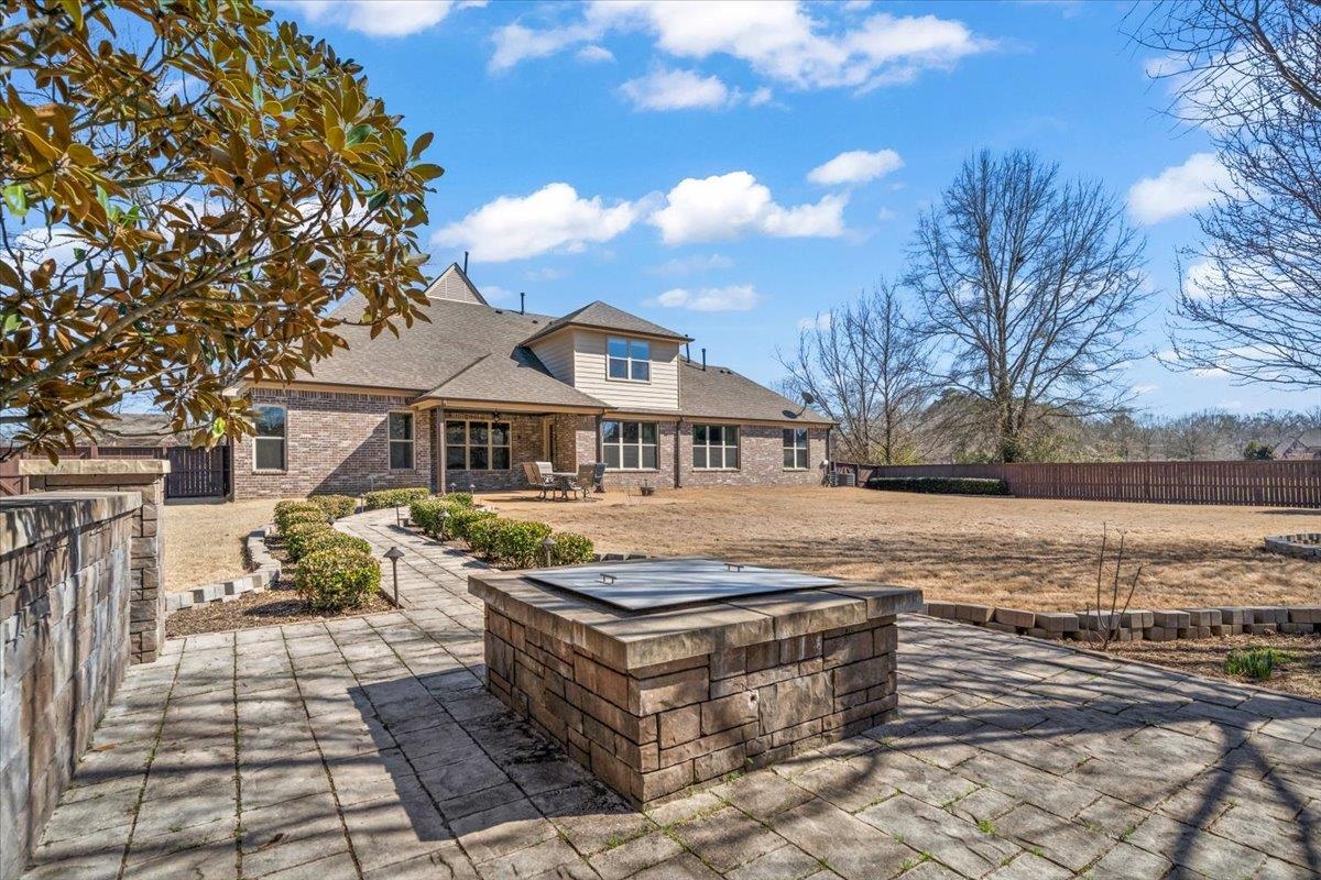 4443 Fleming Road Collierville, TN 38017 - Photo 39 of 40 a front view of house with yard outdoor seating and covered with trees