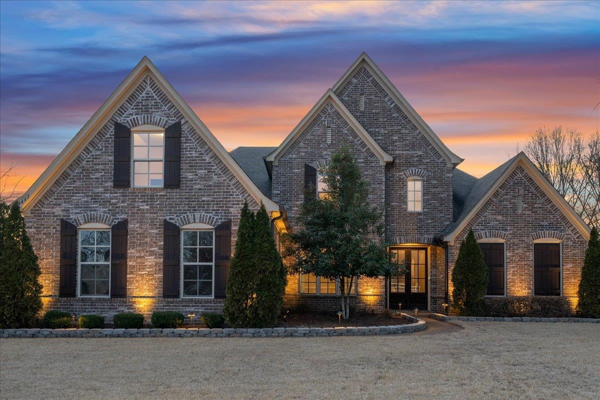 4443 Fleming Road Collierville, TN 38017 - Photo 4 of 40 a front view of a house with a yard