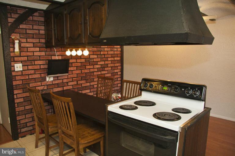 1031 Bayner Road Essex, MD 21221 - Photo 13 of 24 Kitchen w/downdraft over stove