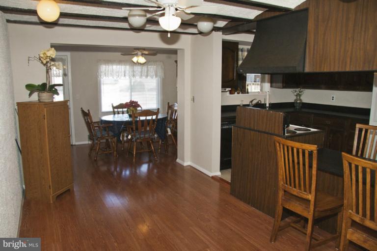 1031 Bayner Road Essex, MD 21221 - Photo 19 of 24 View into Sunroom from Dining Room