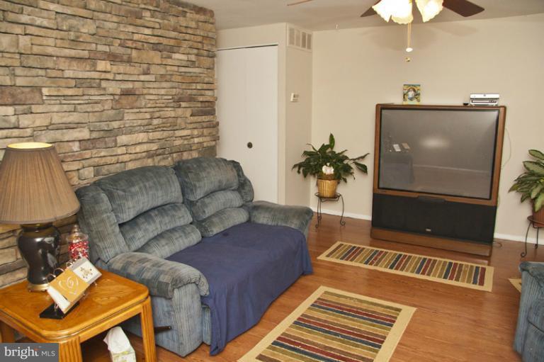 1031 Bayner Road Essex, MD 21221 - Photo 21 of 24 Living Room w/beautiful stone wall