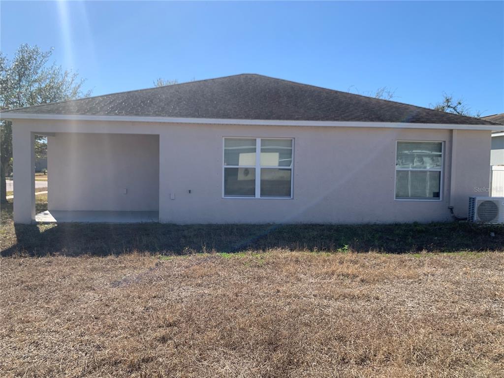 408 Powder View Drive Ruskin, FL 33570 - Photo 5 of 9 a view of house with yard