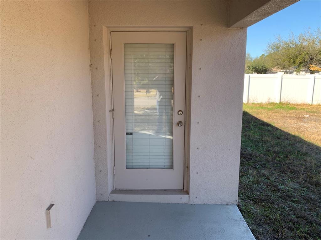 408 Powder View Drive Ruskin, FL 33570 - Photo 7 of 9 a view of an empty room and window