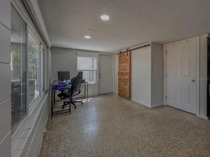 a view of an empty room and closet