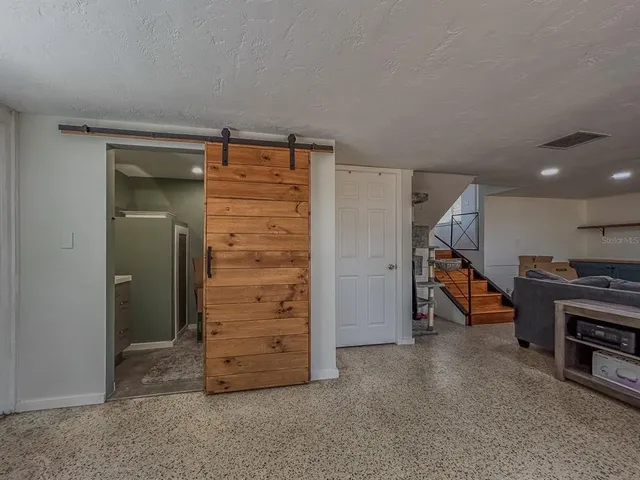 a view of room with furniture