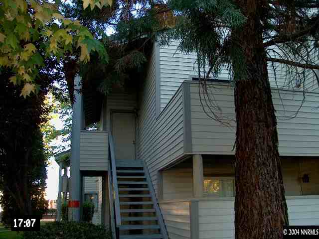 2127 Roundhouse Road, Unit 2127 Sparks, NV 89431 - Photo 1 of 1 a view of a house with a tree