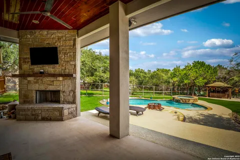 a view of a porch and garden