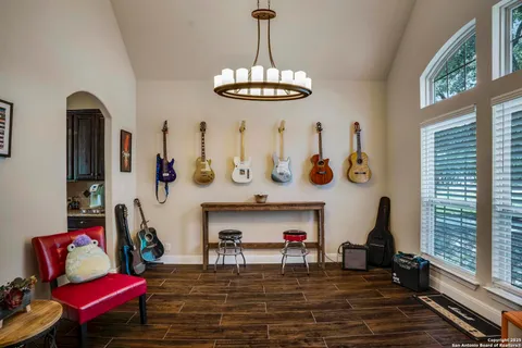 a living room with furniture and a table