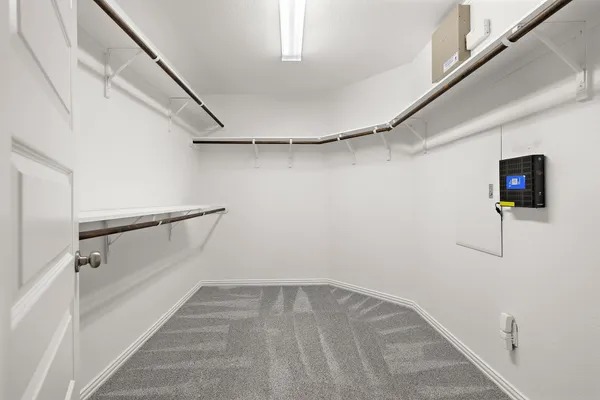 a view of a room with racks on the wall