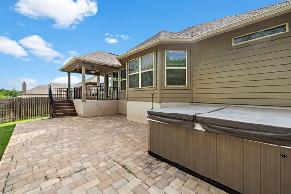 a backyard of a house with seating space