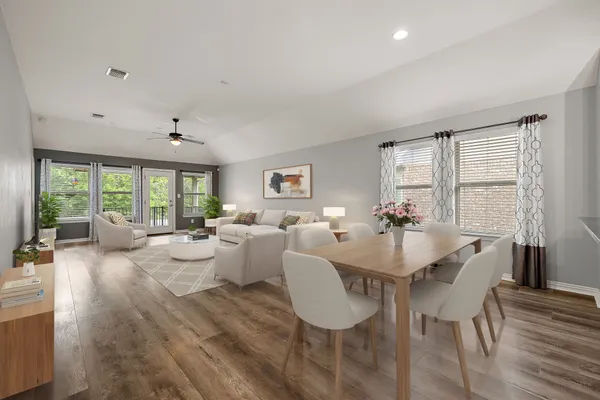 a view of a dining room with furniture window and outside view