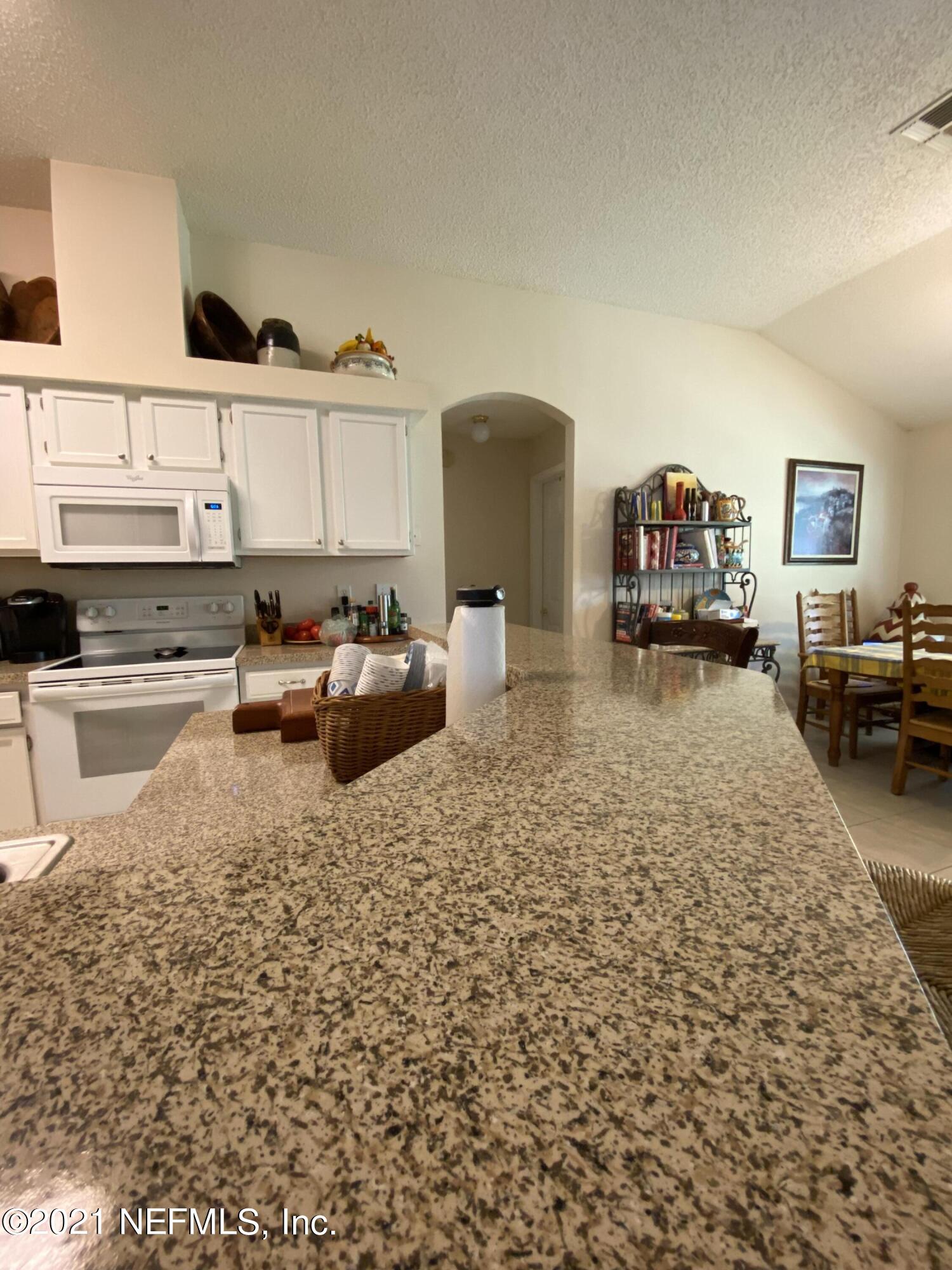4387 Pebble Brook Drive Jacksonville, FL 32224 - Photo 15 of 30 a living room with furniture
