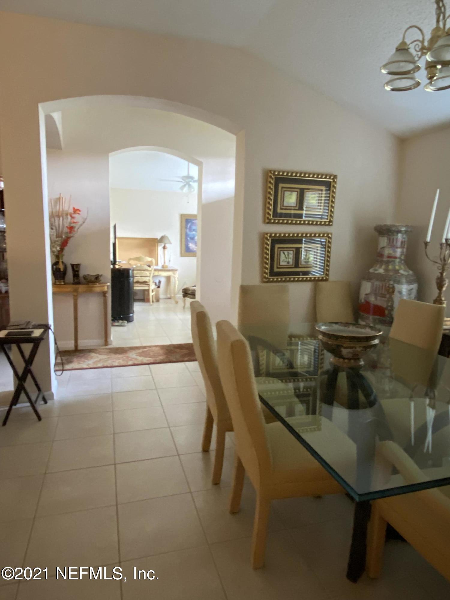 4387 Pebble Brook Drive Jacksonville, FL 32224 - Photo 6 of 30 a workspace with furniture and window