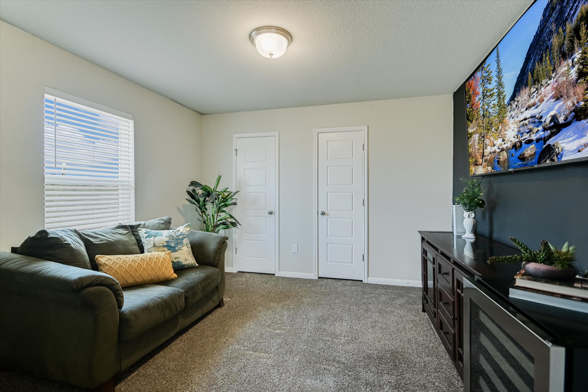 6304 Gunflint Drive Austin, TX 78747 - Photo 16 of 28 A cozy bonus room that's easy to imagine as a media lounge, playroom, or second living space.