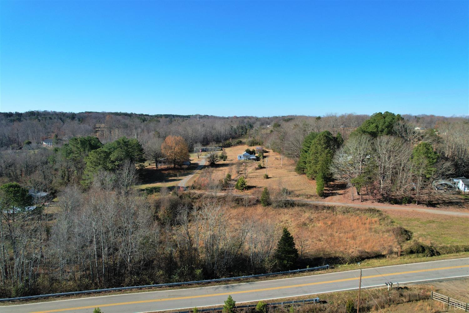 5134 Whispering Pines Road Cascade, VA 24069 - Photo 12 of 45 a view of a houses with a yard