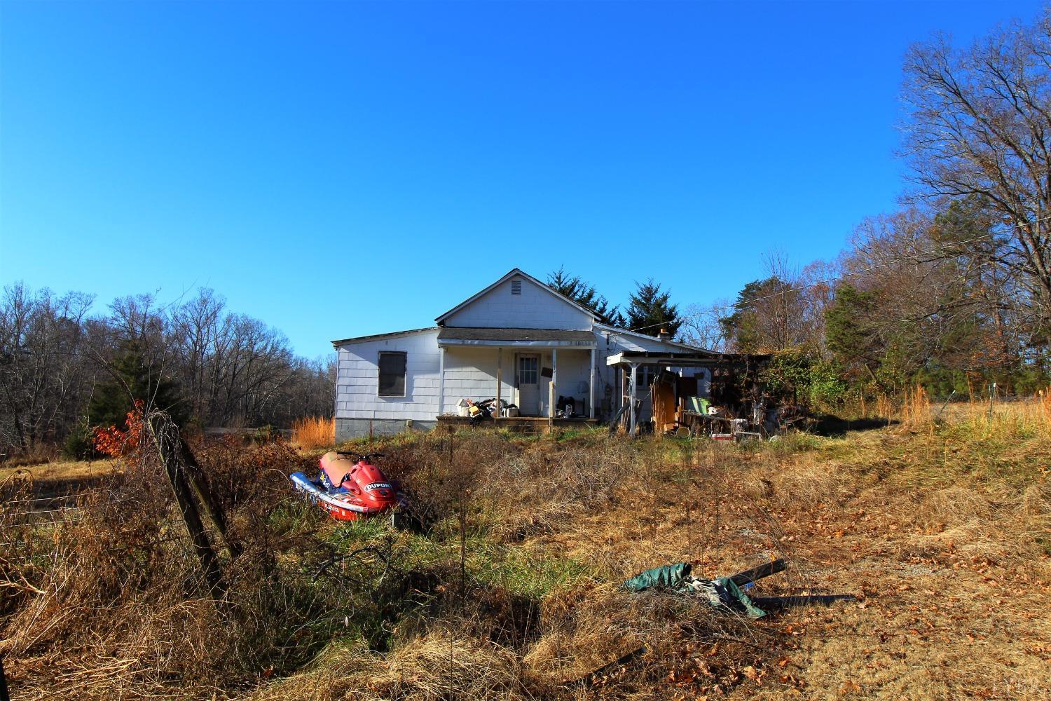 5134 Whispering Pines Road Cascade, VA 24069 - Photo 20 of 45 a view of a house with a yard