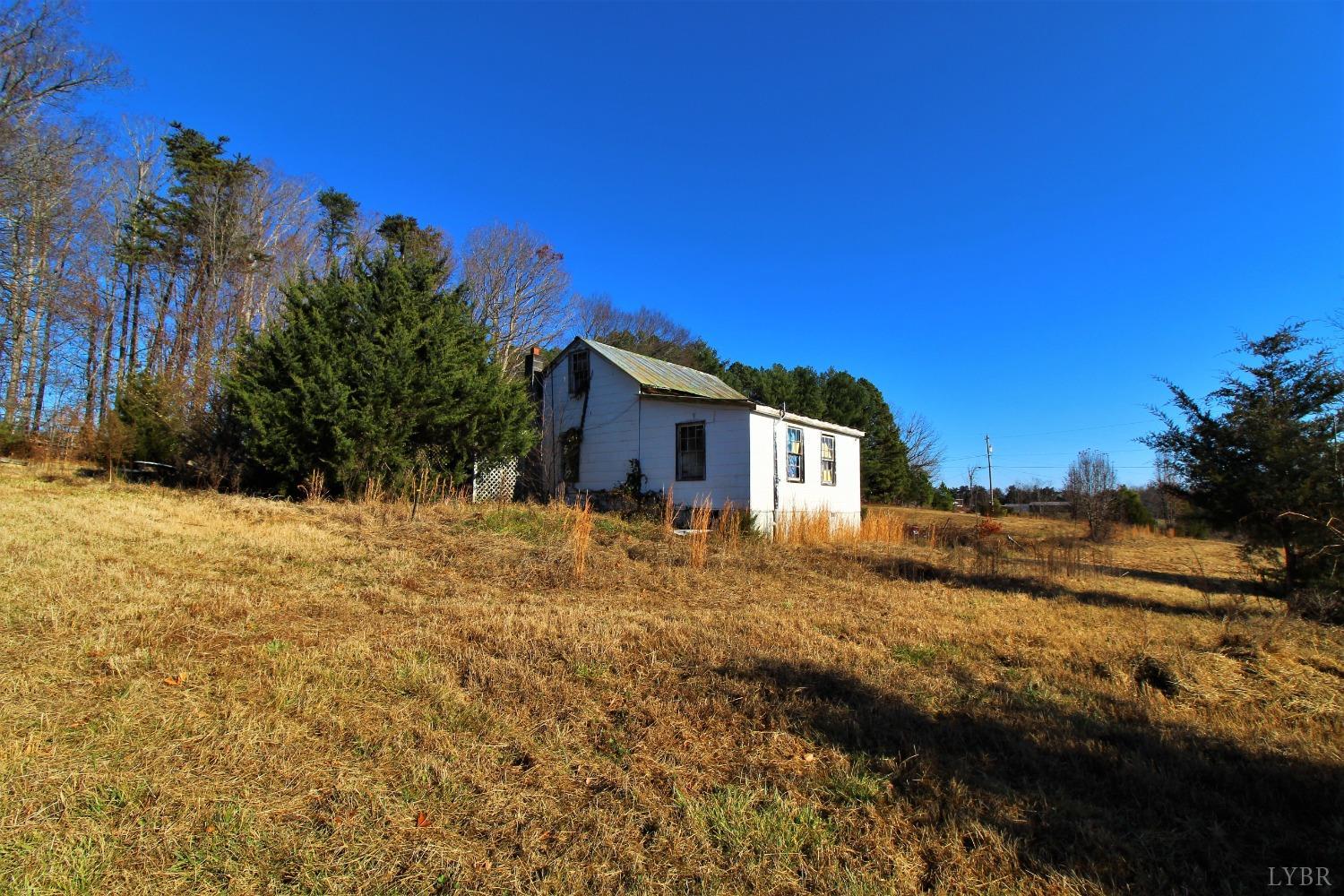 5134 Whispering Pines Road Cascade, VA 24069 - Photo 22 of 45 a view of a house with a yard
